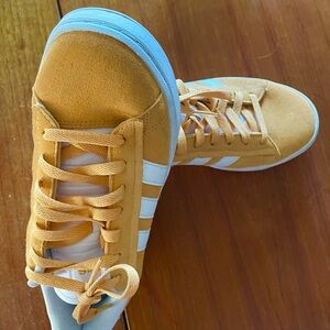 Adidas White and Orange Sneakers Classic Athletic Silhouette